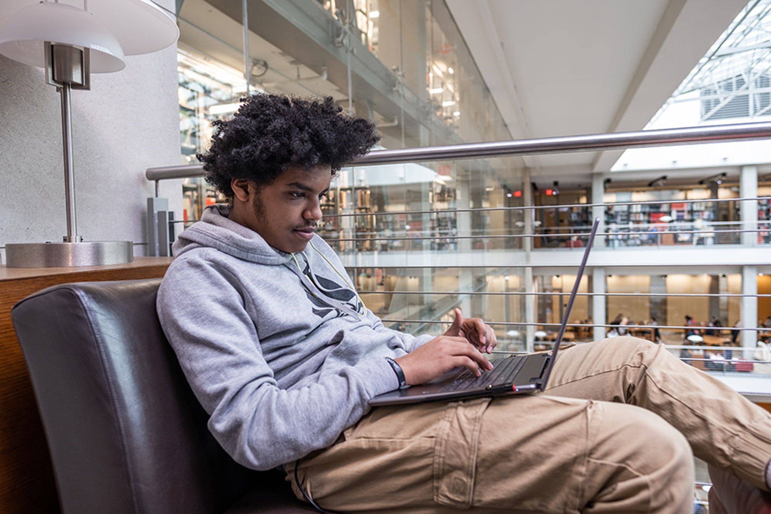 Student Studying In Library