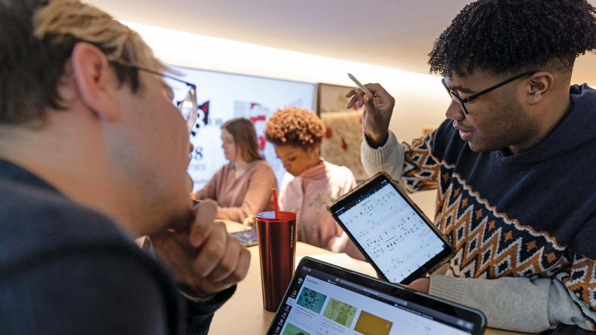 Wyatt Kerns and Jonathan Mitchell collaborate on a project between classes